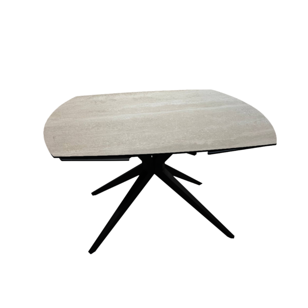 Chara White Extendable Table 130/190×95 (Copy) Discover the Chara Table - made of heat-resistant ceramic and tempered glass, offering a modern and sophisticated design, perfect for any elegant dining experience.Thanks to the innovative rotary extension mechanism, the table expands quickly and easily, reaching a length of up to 190 cm, with a width of 95 cm and a height of 76 cm, ensuring optimal comfort for any occasion - from intimate dinners to festive gatherings.